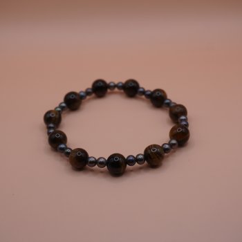 armb�nd med gr�/brune perler